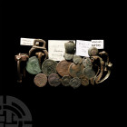 Roman Artefact Group. Mainly 1st-4th century A.D. A mixed group of Roman artefacts comprising: brooches of various types, including enamelled examples...