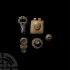 Roman and Later Military and Other Fitting Group. Mainly 2nd-3rd century A.D. A mixed group including a bronze buckle-plate with repoussé face, an umb...