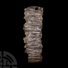 Palestinian Lead Amulet with Magical Aramaic Inscription. 2nd-mid 8th century A.D. An amulet fragment with tapering, flat-section body, bearing c.29 l...