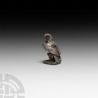 Roman 'Thames' Silver Eagle. 3rd-early 5th century A.D. A silver eagle modelled standing on a sub-square base, with semi-naturalistic detailing to the...