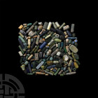 Roman Glass Bead Collection. 30 B.C.-323 A.D. and later. A mixed group of over 150 glass beads comprising various colours and types, including example...