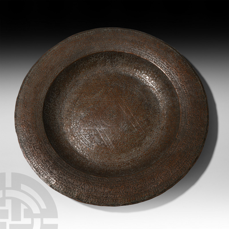 Very Large Mamluk Deep Tinned Copper Tray. 16th century A.D. A very large tinned...