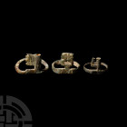 Roman Key Ring Collection. 1st-5th century A.D. A group of three ring-keys comprising: one with a perforated rectangular bit; one with serrated U-shap...