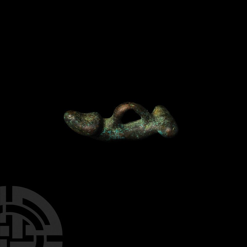 Roman Phallic Pendant. 2nd-3rd century A.D. A bronze amuletic pendant formed as ...