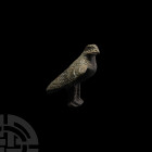 Roman Eagle Statuette. 1st-3rd century A.D. A copper-alloy eagle statuette modelled standing with feather detailing. 51.7 grams, 48 mm (1 7/8 in.) Ger...