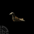 Roman Fork-Tailed Bird Statuette. c.2nd century A.D. A bronze dove-like bird statuette, modelled with folded wings and a forked tail. 14.65 grams, 39 ...