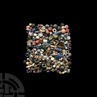 Roman and Other Glass Bead Collection. 1st century B.C.-4th century A.D. A mixed group of glass beads of various colours and types, including examples...
