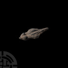Roman Aquatic Creature Weight. c.2nd century A.D. A lead-alloy weight formed as an aquatic creature. 10.9 grams, 41 mm (1 5/8 in.) Acquired 1970s. Pro...