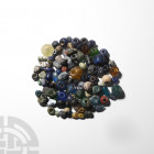 Roman Glass Bead Collection. 1st-3rd century A.D. and later. A group of over one hundred furnace-wound and other glass beads of various types and colo...