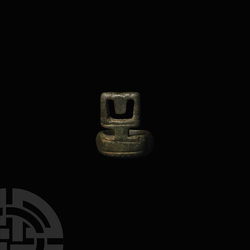 Roman Ring Key. 2nd-3rd century A.D. A substantial bronze ring with incised bord...