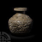 Chandraketugarh Globular Vase with Flying Goddesses. 2nd-1st century B.C. A large bulbous ceramic vessel with elaborate frieze of flying winged goddes...