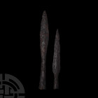 Roman Socketted Arrowhead and Javelin. c.2nd-3rd century A.D. A pair of iron arrowheads with lentoid-section blades, both leaf-shaped with different p...