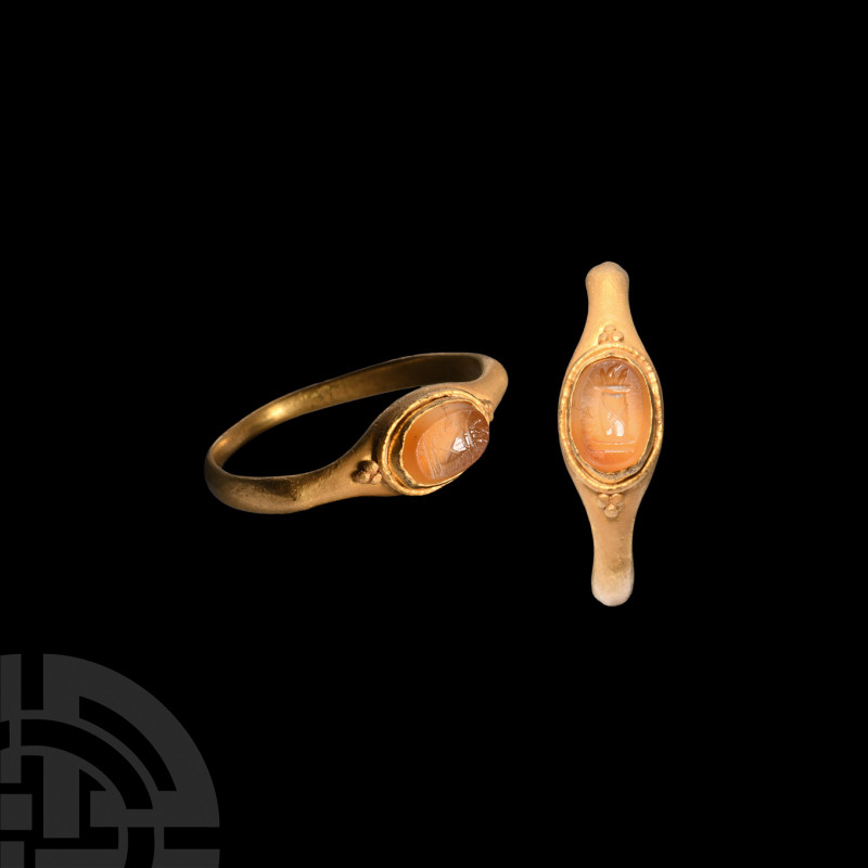 Roman Altar Gemstone in Gold Ring. 1st century A.D. A carnelian intaglio gemston...
