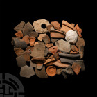A Large Quantity of Roman Pottery Sherds. c.1st-4th century A.D. A mixed group of pot sherds from various vessel types including rims and decorated ex...
