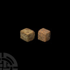 Roman Bone Dice Pair. 1st-4th century A.D. A pair of bone dice with ring-and-dot numerals each composed: 1:6; 2:5; 3:4. 3.45 grams total, 10-11 mm (1/...