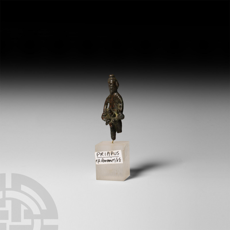 Roman Priapus Statuette. 1st-3rd century A.D. A bronze Priapus figure modelled s...