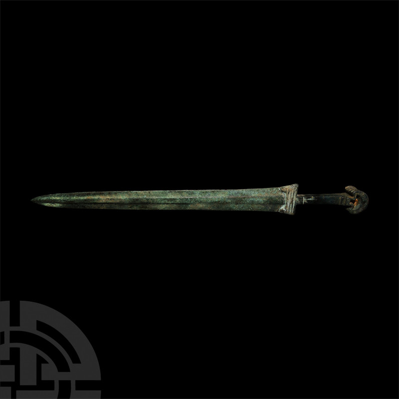 Luristan Short Sword. 13th-9th century B.C. A bronze short sword with double-edg...