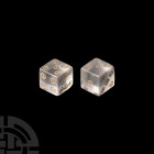 Roman Rock Crystal Dice Pair. 1st-2nd century A.D. A pair of carved rock crystal cuboid dice with incised ring-and-dot markings disposed 1:6, 2:5, 3:4...