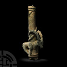 Luristan Standard Finial with Ibex and Serpent. 12th century B.C. A staff or a standard finial composed of a tapering tubular body, collared at both e...