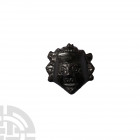 Roman Stud with Bust. 1st-2nd century A.D. A stud formed as a stylised human head with short hair; cylindrical lug to reverse. 6.4 grams, 25 mm (1 in....