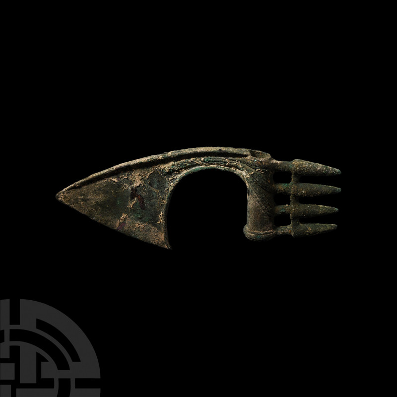Luristan Butted Axehead. 12th-11th century B.C. A spike-butted bronze axe with a...