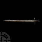 Medieval Long Sword. 12th-late 13th century A.D. A long double-edged iron sword of Oakeshott Type Xa or XI and Petersen Type X, with broad tapering bl...