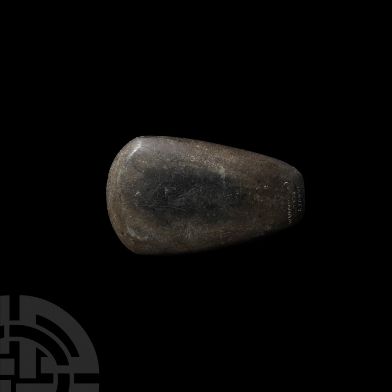 Stone Age Polished Hand Axe. Neolithic, 4th-3rd millennium B.C. A polished green...