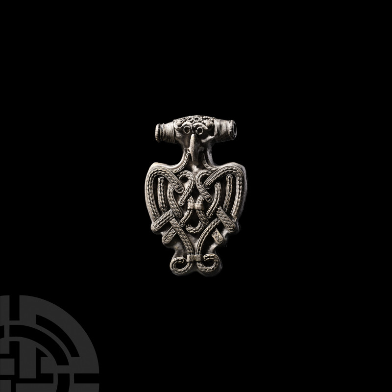 Viking Age Silver Filigree Zoomorphic Pendant. 9th-12th century A.D. A silver zo...