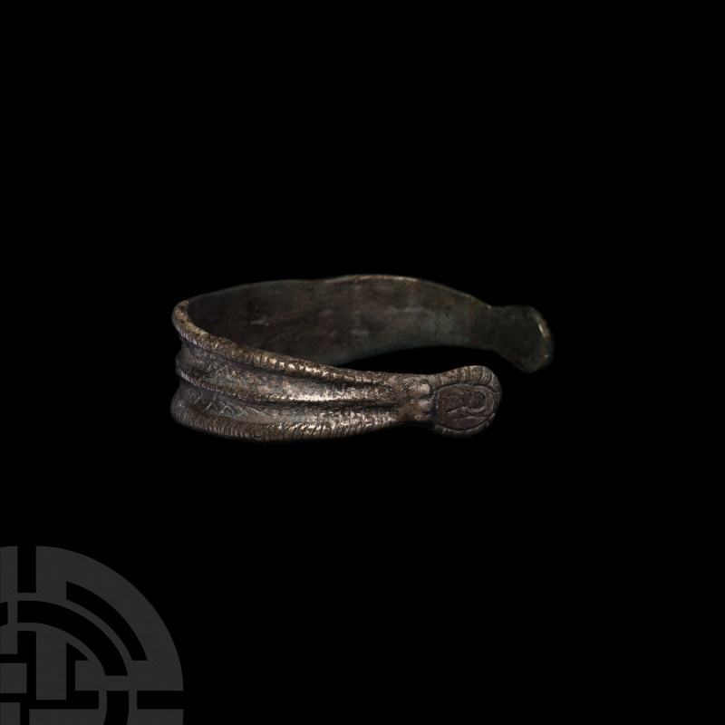 Viking Bracelet with Decorated Terminals. 9th-12th century A.D. A penannular bra...