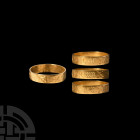 Medieval Gold 'I Stand By Him' Posy Ring. 15th century A.D. A gold flat-section annular band inscribed in black letter script '+ IE MY TIEN' for 'I St...