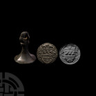 Large Heraldic Seal Matrix for R T of the Towers Family. 14th-15th century A.D. A bronze chessman seal matrix with pierced trilobe finial, ribbed coll...