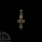 Byzantine Reliquary Cross Pendant. 10th-11th century A.D. A bronze two-part enkolpion reliquary cross with hinge and fastening mount, suspension ring ...