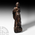Large Tudor Period Limewood Figure of a Lady. 16th century A.D. A carved limewood figure of female, wearing a floor-length robe gathered at the waist ...