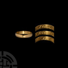 Gold 'A True Friends Gift' Posy Ring. 17th-18th century A.D. A gold posy ring with D-section hoop, interior inscribed 'A true friends gift' in script,...