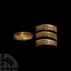 Gold 'Gift to a Loyal Friend' Posy Ring. 16th-17th century A.D. A gold posy ring composed of a D-section hoop, the outer face decorated with pellets a...