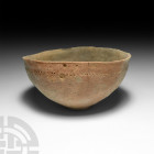 Holy Land Decorated Terracotta Bowl. 3000-2700 B.C. A terracotta bowl with carinated body, shallow foot, everted rim and circumferential band of prick...