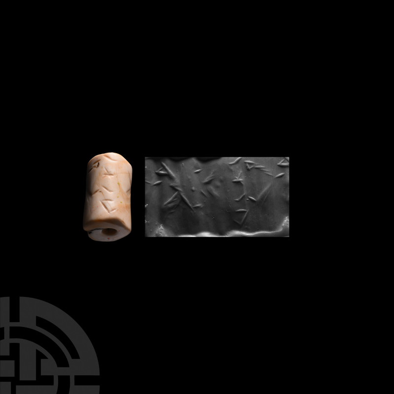 Shell Cylinder Seal with Symbols. c.2nd millennium B.C. A cylinder seal produced...