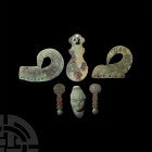 Mount Group. Mainly 1st millennium B.C. A mixed group of mounts of various forms, each with piercings for attachment or lugs to reverse; the mount for...