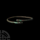 Arm Ring with Serpent Terminals. 12th-6th century B.C. A bronze penannular round-section bracelet with the terminals in the form of serpent heads. See...
