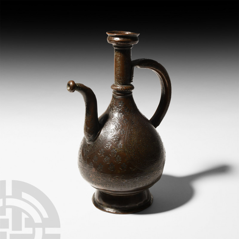 Ottoman Copper Ewer. Late 19th century A.D. A piriform copper ewer with swan-nec...