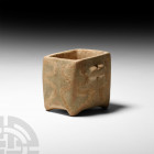Ziwiye Composition Vessel. 9th-7th century B.C. A composition vessel composed of a rectangular body with slightly convex walls, rounded stub foot at e...