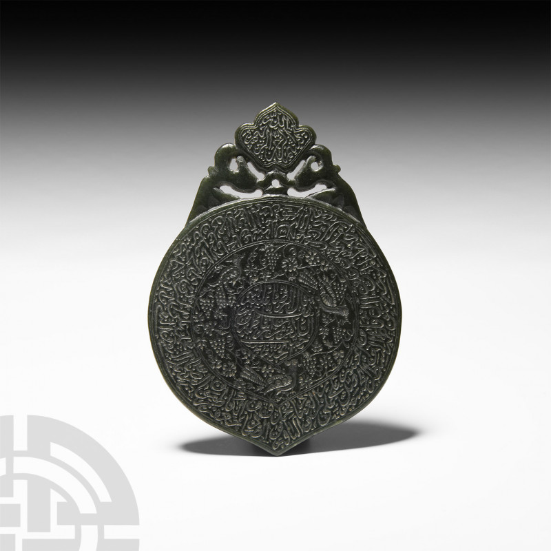 Calligraphic Jade Plaque. 19th century A.D. A jade plaque with ogival openwork f...