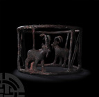 Elamite Bowl Stand with Ibexes. Late 3rd-early 2nd millennium B.C. A bronze bowl stand with openwork cylindrical body comprising a pair of round-secti...