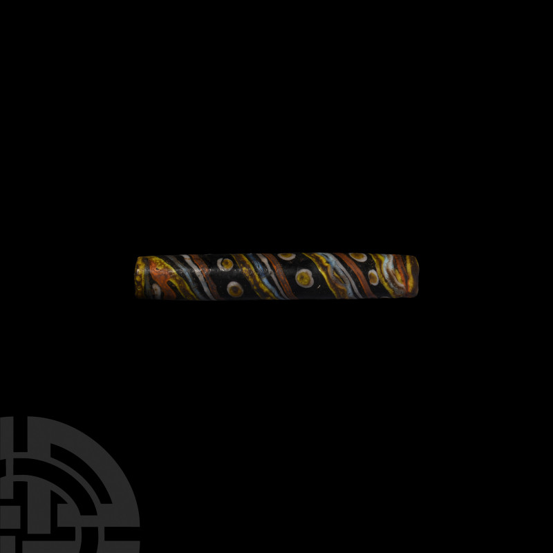 Large Western Asiatic Polychrome Glass Bead. 20th century A.D. A polychrome glas...