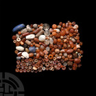 Bead and Pendant Collection. 2nd-1st millennium B.C. A group of over two hundred stone beads and pendants including carnelian, lapis lazuli, agate, am...
