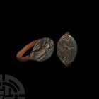 Achaemenid Ring with Soldier. 5th-4th century B.C. A bronze ring with D-section hoop and ellipsoid bezel, bearing incuse soldier figure carrying a wea...