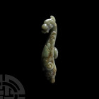 Chinese Jade Dragon Belt Hook. 19th century A.D. A carved jade belt hook in the form of the upper body of a dragon, with geometric detailing to the to...