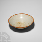 Chinese Song Glazed Bowl. Song Dynasty, 960-1279 A.D. A pale blue-green glazed conical bowl with shallow foot. 201 grams, 15.9 cm wide (6 1/4 in.) Acq...