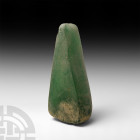Large Thai Teardrop-Shaped Green Glass Ingot. 1st century B.C.-4th century A.D. A substantial green glass ingot, triangular in plan with rounded edges...