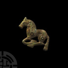 Ordos Horse Attachment. 6th-2nd century B.C. A plaque formed as a horse viewed in profile galloping left, detailing to head, mane, body, tail and hoov...